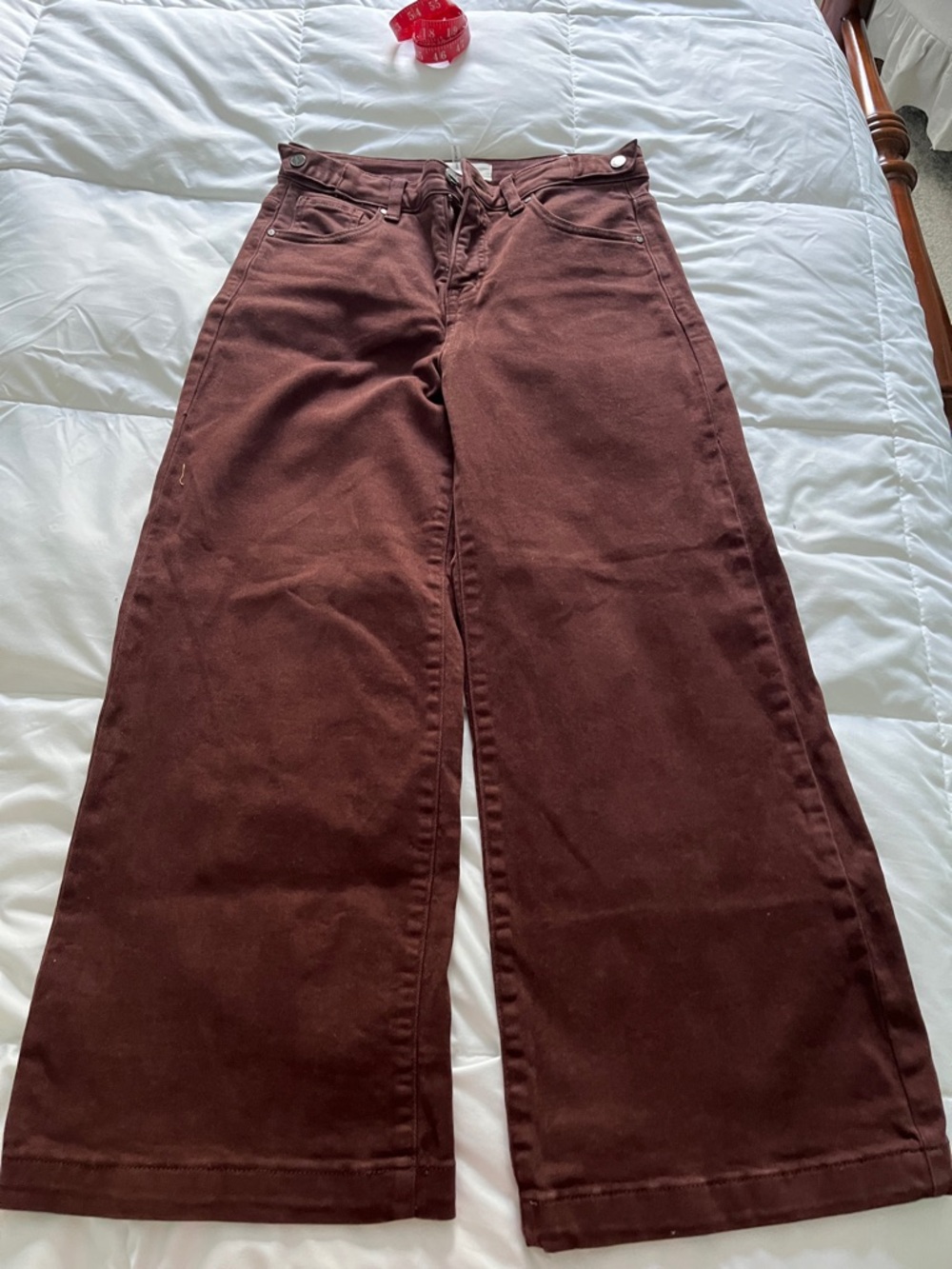 Risen brown wide legged, cropped jeans. 
Worn once. Adjustable waist.